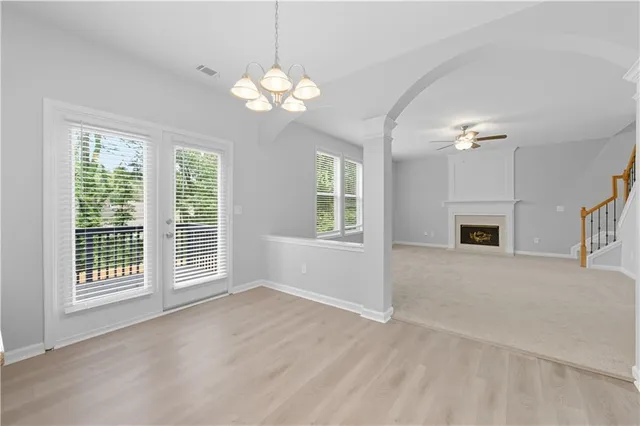 a bathroom with a sink toilet and a mirror