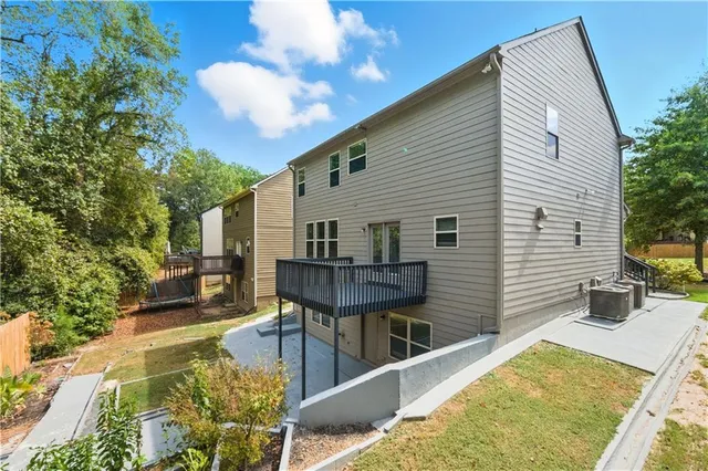 a house view with a outdoor seating