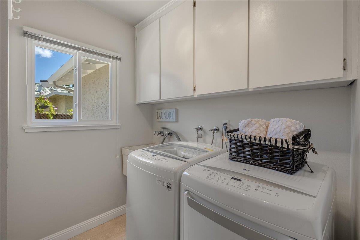 1204 Lubich Drive Mountain View, CA 94040 - Photo 16 of 39 a kitchen with a stove and cabinets
