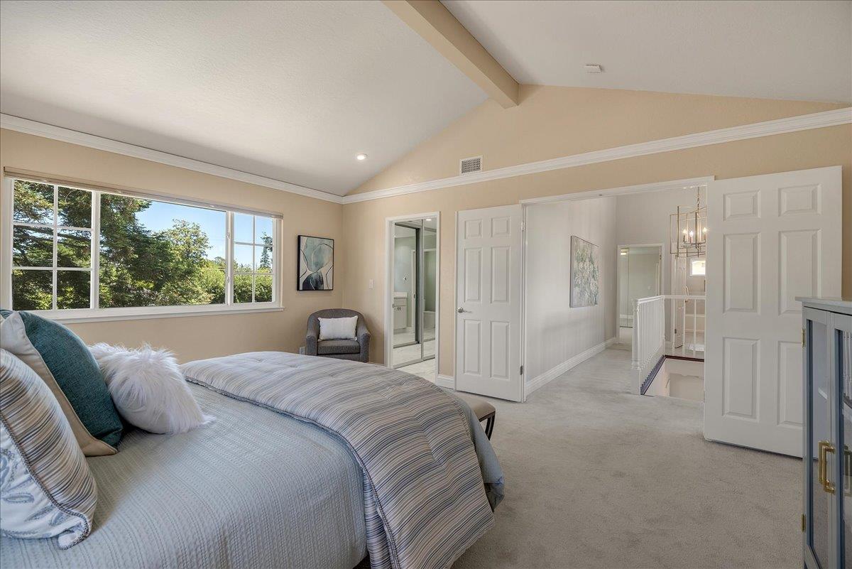 1204 Lubich Drive Mountain View, CA 94040 - Photo 19 of 39 a large bedroom with a bed and a window