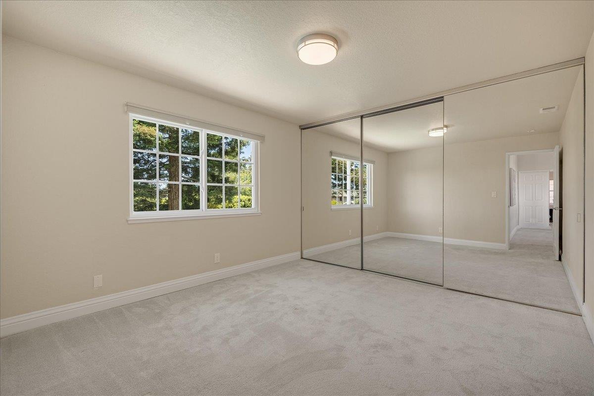1204 Lubich Drive Mountain View, CA 94040 - Photo 24 of 39 an empty room with a empty space and windows
