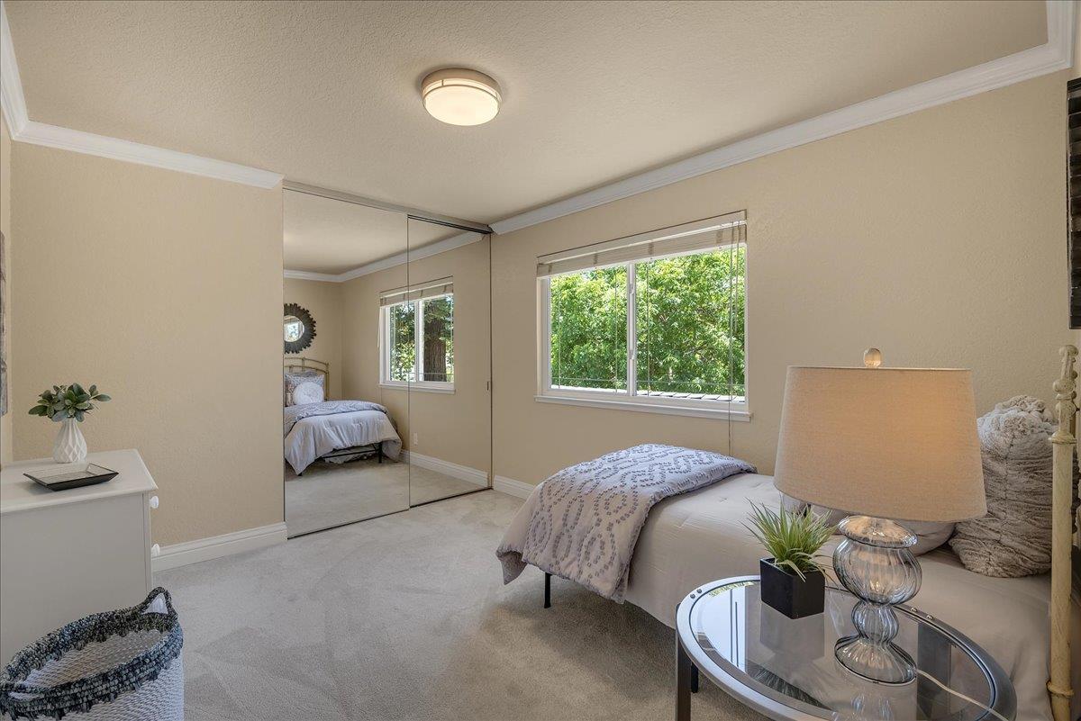 1204 Lubich Drive Mountain View, CA 94040 - Photo 25 of 39 a bed room with a bed and a couch