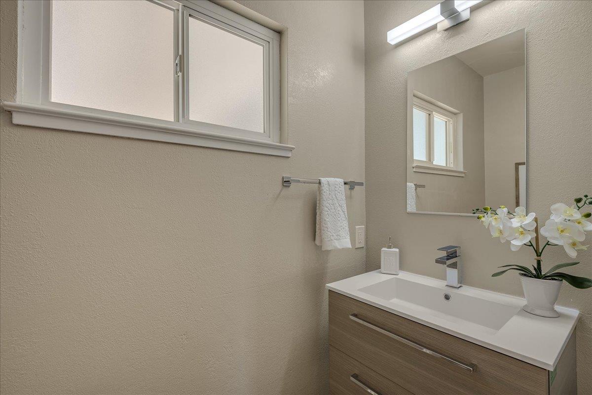 1204 Lubich Drive Mountain View, CA 94040 - Photo 28 of 39 a bathroom with a sink and a mirror