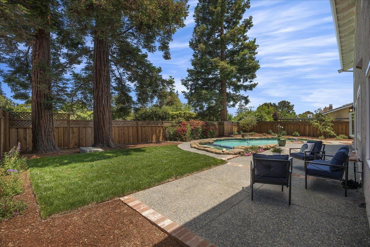 1204 Lubich Drive Mountain View, CA 94040 - Photo 29 of 39 a view of a backyard with sitting area