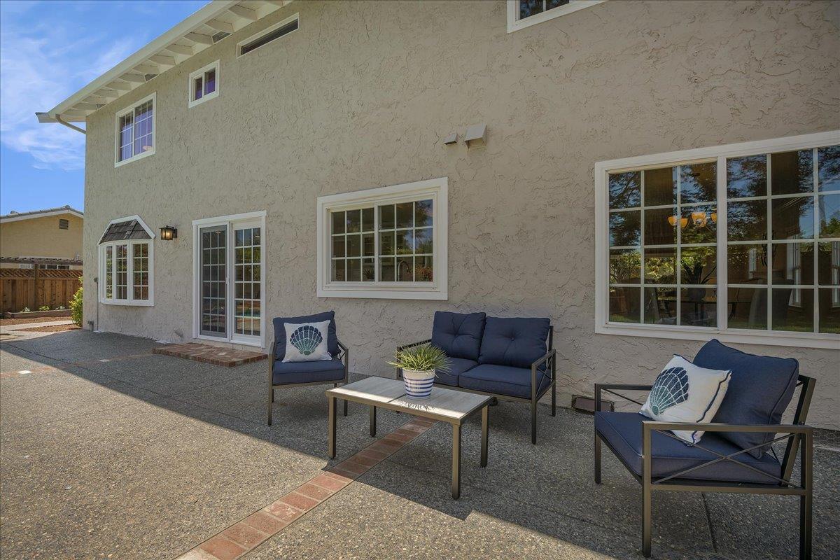 1204 Lubich Drive Mountain View, CA 94040 - Photo 32 of 39 a balcony with furniture and windows