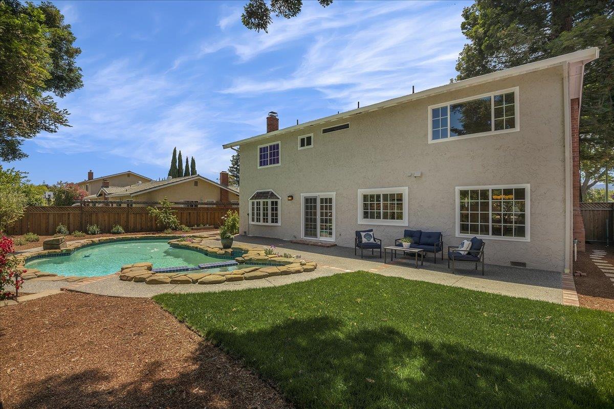 1204 Lubich Drive Mountain View, CA 94040 - Photo 33 of 39 a backyard of a house with yard and outdoor seating