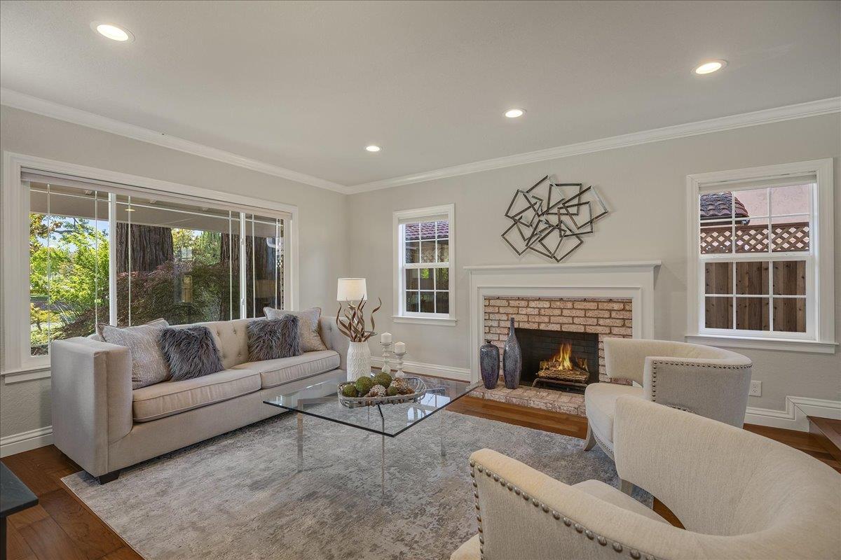 1204 Lubich Drive Mountain View, CA 94040 - Photo 5 of 39 a living room with furniture and a fireplace