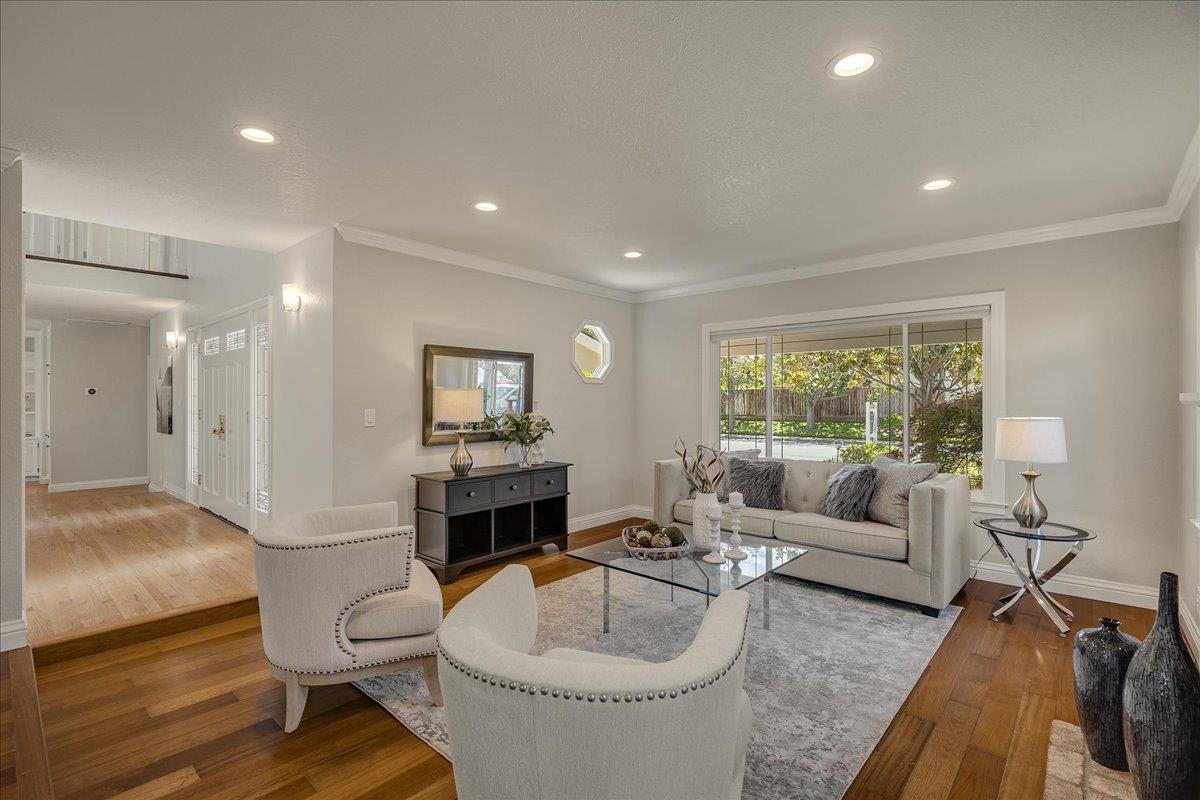1204 Lubich Drive Mountain View, CA 94040 - Photo 6 of 39 a living room with furniture and a fireplace