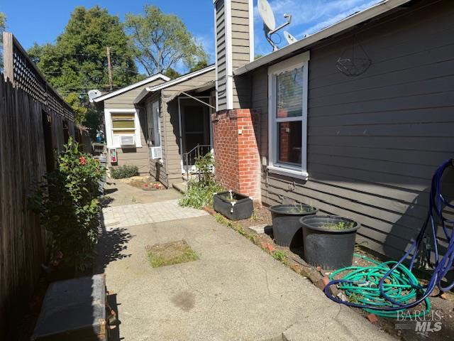 618 Benton Street Santa Rosa, CA 95404 - Photo 14 of 27 a front view of a house with garden