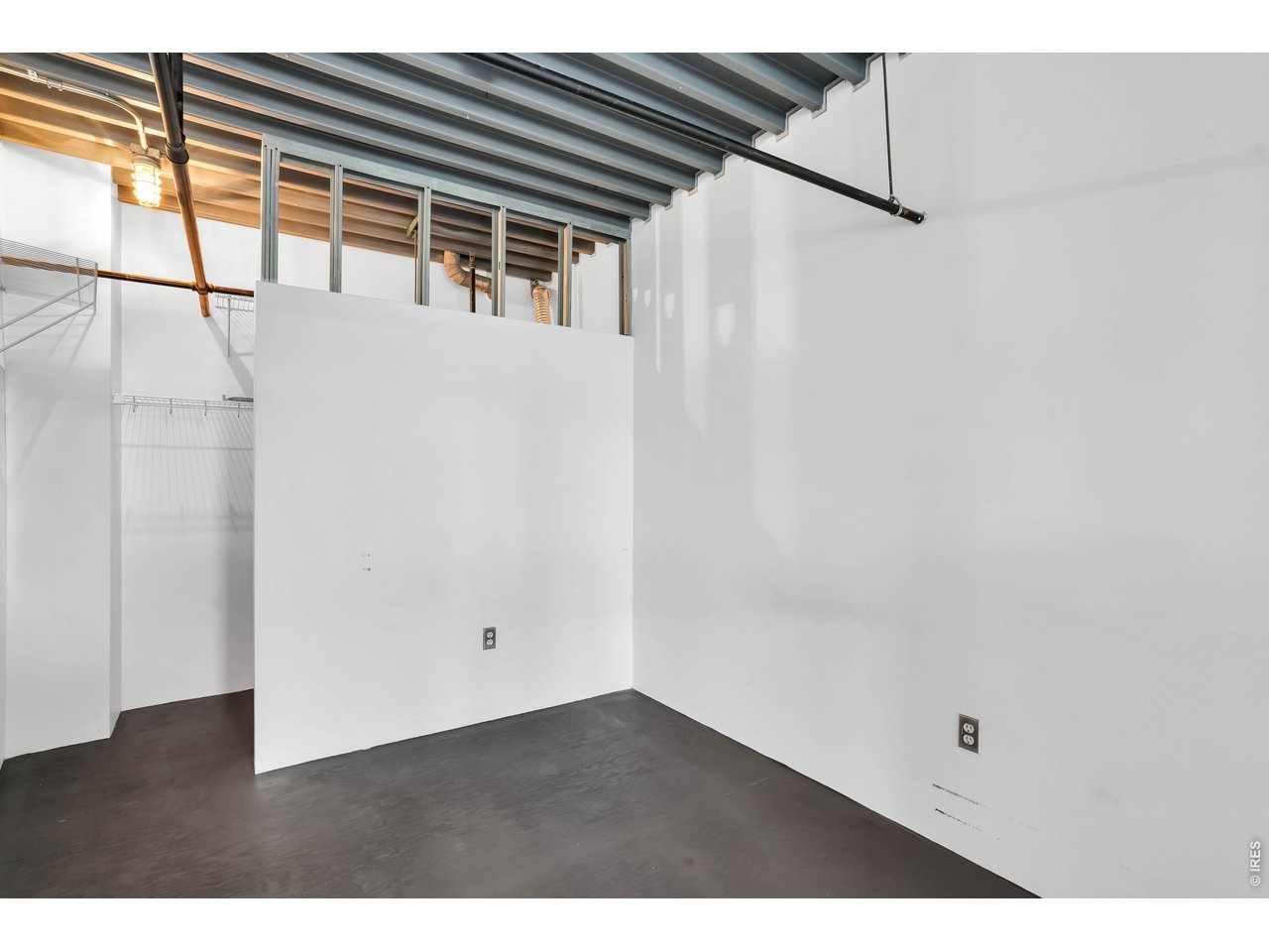 3457 Ringsby Court, Unit 327 Denver, CO 80216 - Photo 20 of 29 a view of an empty room