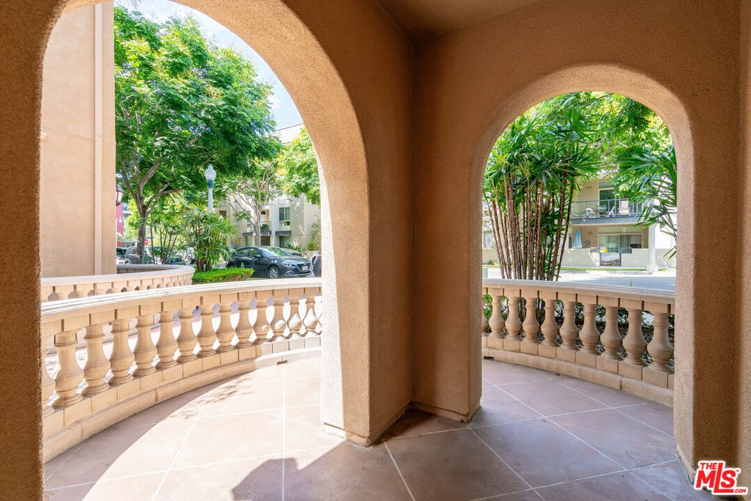 13080 Pacific Promenade, Unit 109 Playa Vista, CA 90094 - Photo 18 of 60 a view of a porch with a yard