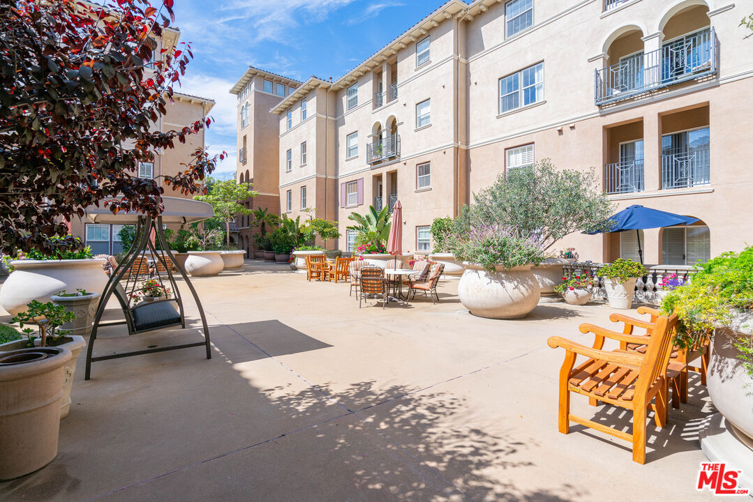 13080 Pacific Promenade, Unit 109 Playa Vista, CA 90094 - Photo 25 of 60 front view of a building with sitting area