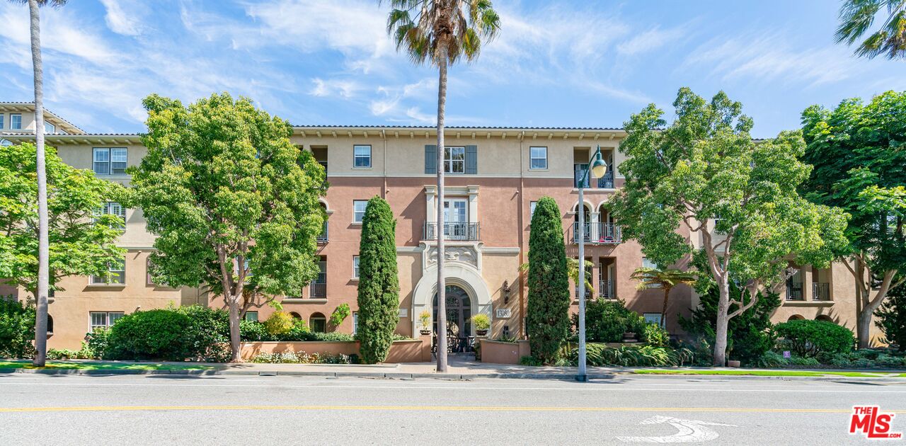 13080 Pacific Promenade, Unit 109 Playa Vista, CA 90094 - Photo 36 of 60 a front view of a house with a yard and garage
