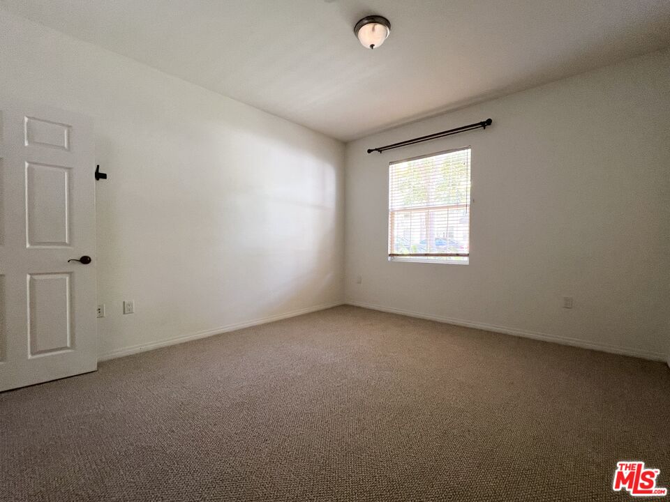 13080 Pacific Promenade, Unit 109 Playa Vista, CA 90094 - Photo 55 of 60 an empty room with a window