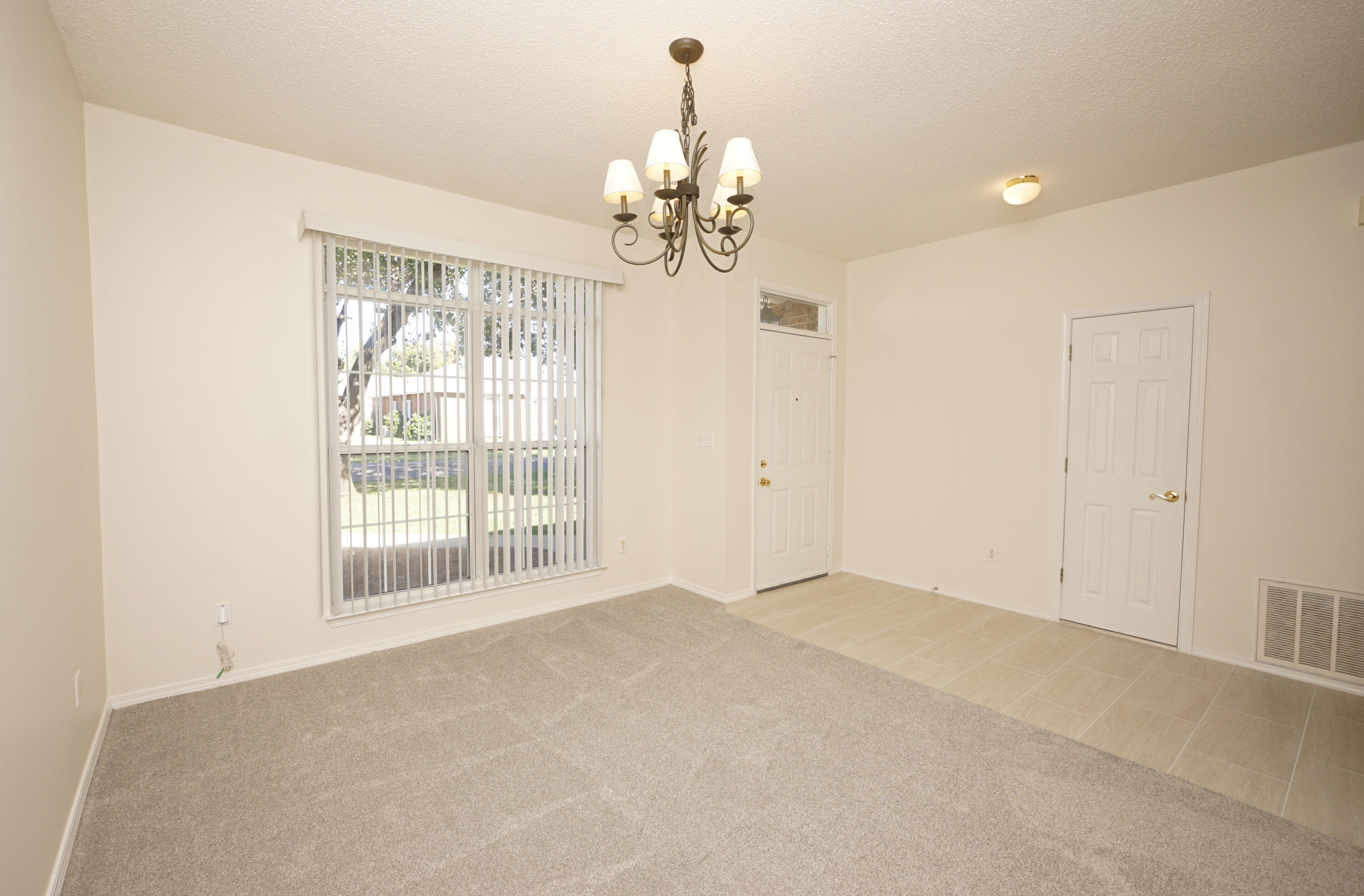 4505 Parkwood Square Niceville, FL 32578 - Photo 11 of 30 a view of an empty room with a window