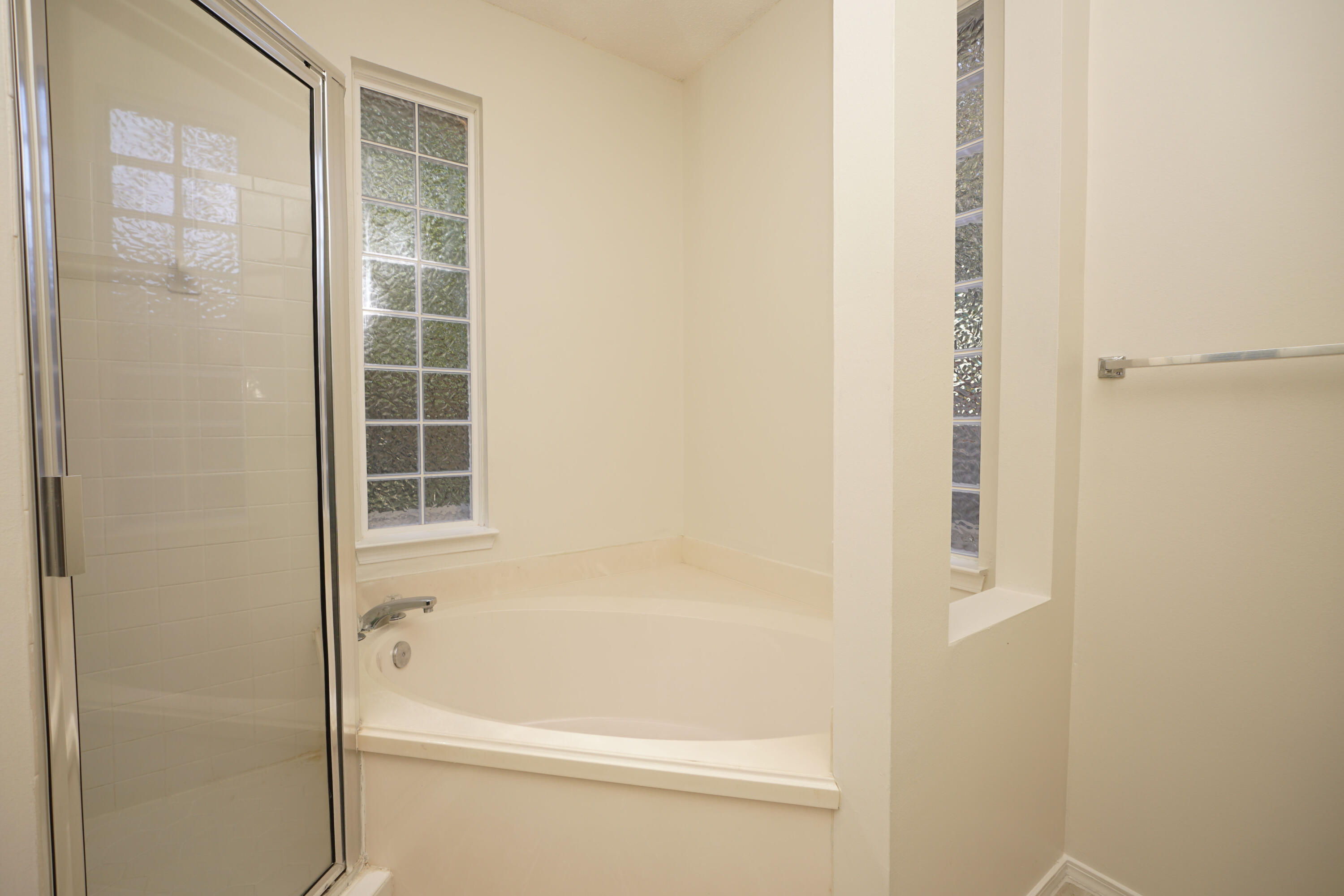 4505 Parkwood Square Niceville, FL 32578 - Photo 17 of 30 a white bath tub sitting next to a shower