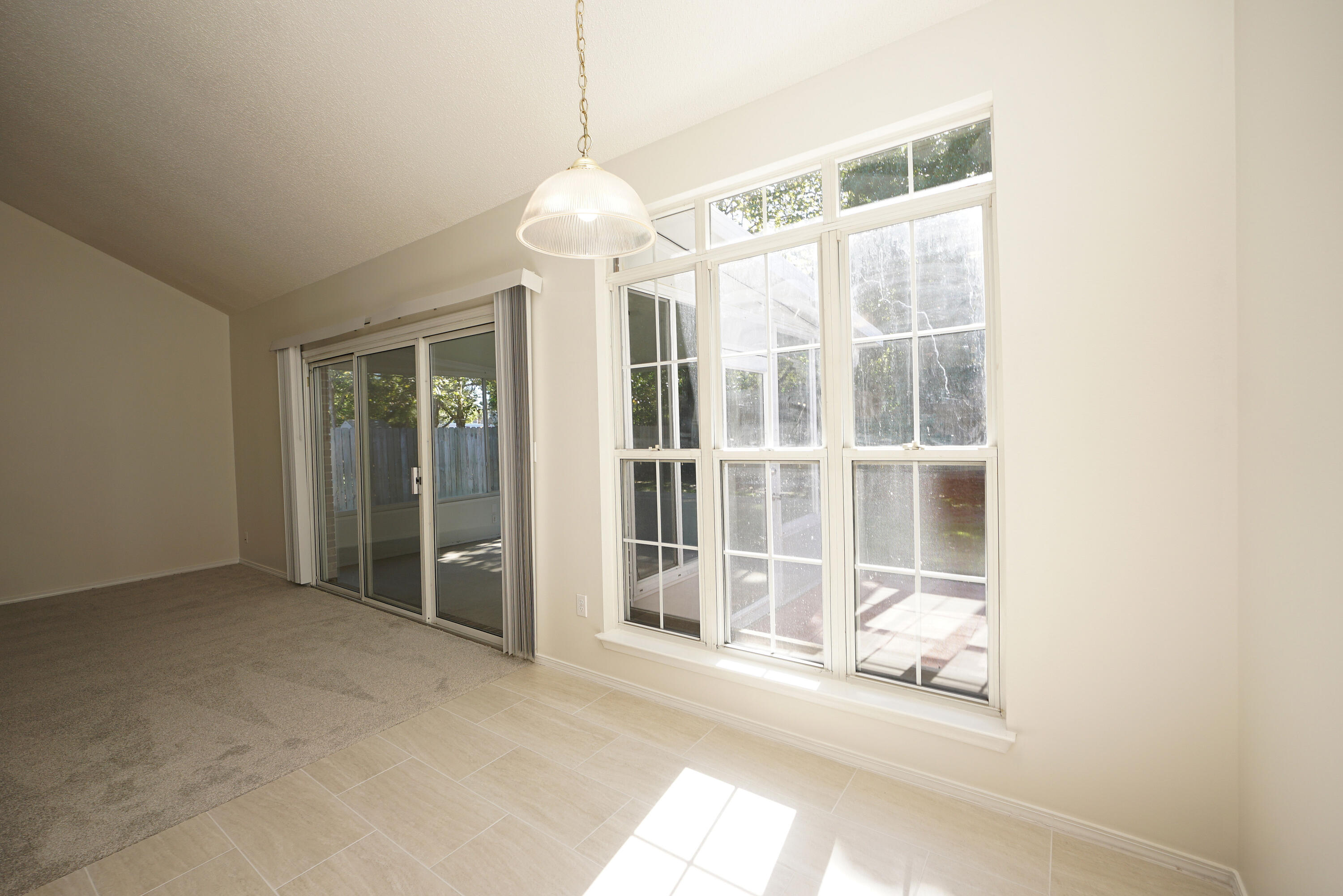 4505 Parkwood Square Niceville, FL 32578 - Photo 7 of 30 a view of an empty room with a window