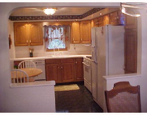 251 Ruth Street Plum, PA 15239 - Photo 5 of 8 Kitchen. Updated and Ceramic Galore in this Quaint Kitchen Contemporary Elegance with Lots of Oak with Pantry! Dimmer switch comfort and recessed lighting! Fully Equipped Eat in Delightful Kitchen!!!