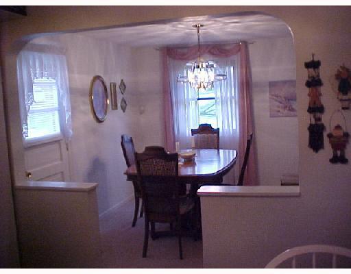 251 Ruth Street Plum, PA 15239 - Photo 6 of 8 Dining Room. Half walls and Archway to Bright Dining Side Door Entry a step away!