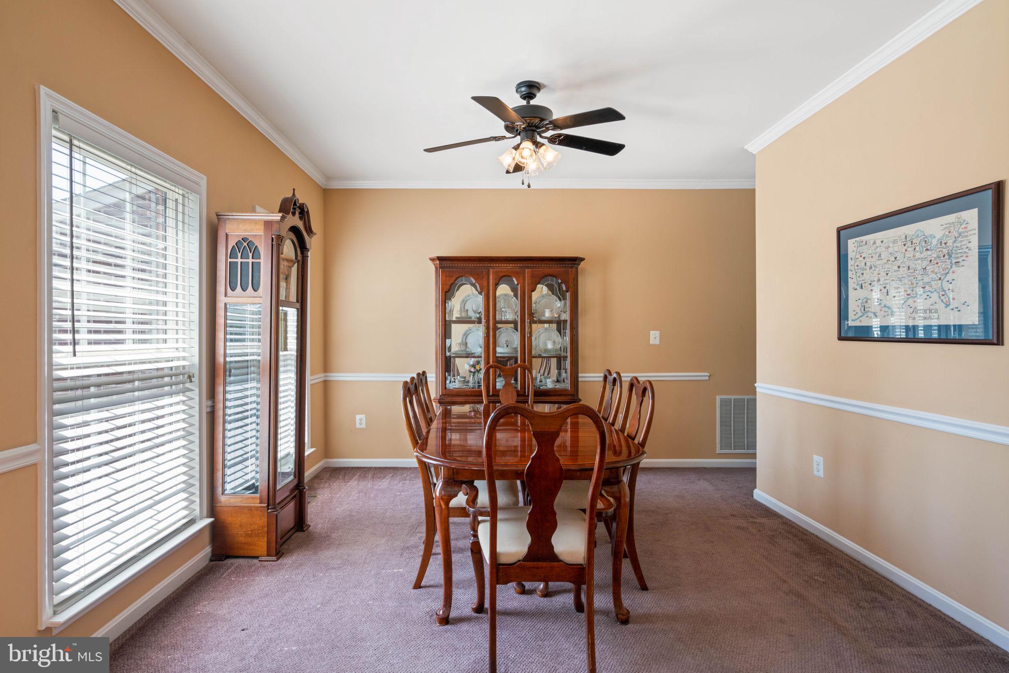 11002 Park Ridge Road Fredericksburg, VA 22408 - Photo 9 of 51 Formal Dining with chair rail and crown molding