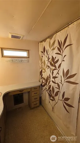 a view of a livingroom with furniture