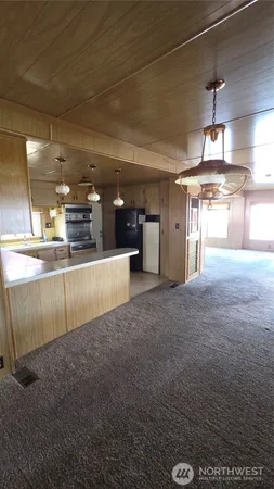 a view of a kitchen with a sink