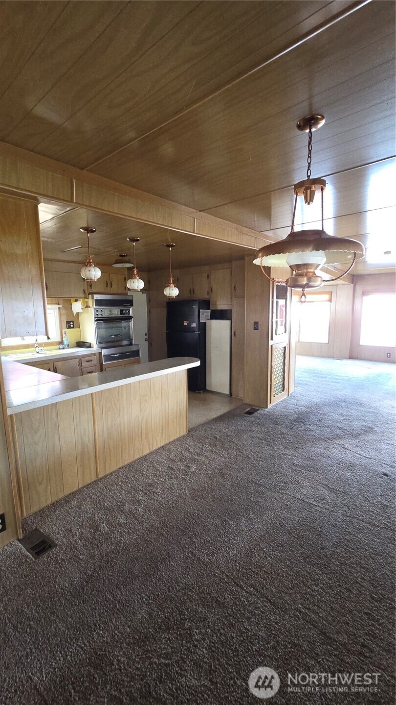 8314 38th Street East, Unit 4 Edgewood, WA 98371 - Photo 8 of 21 a view of a kitchen with a sink