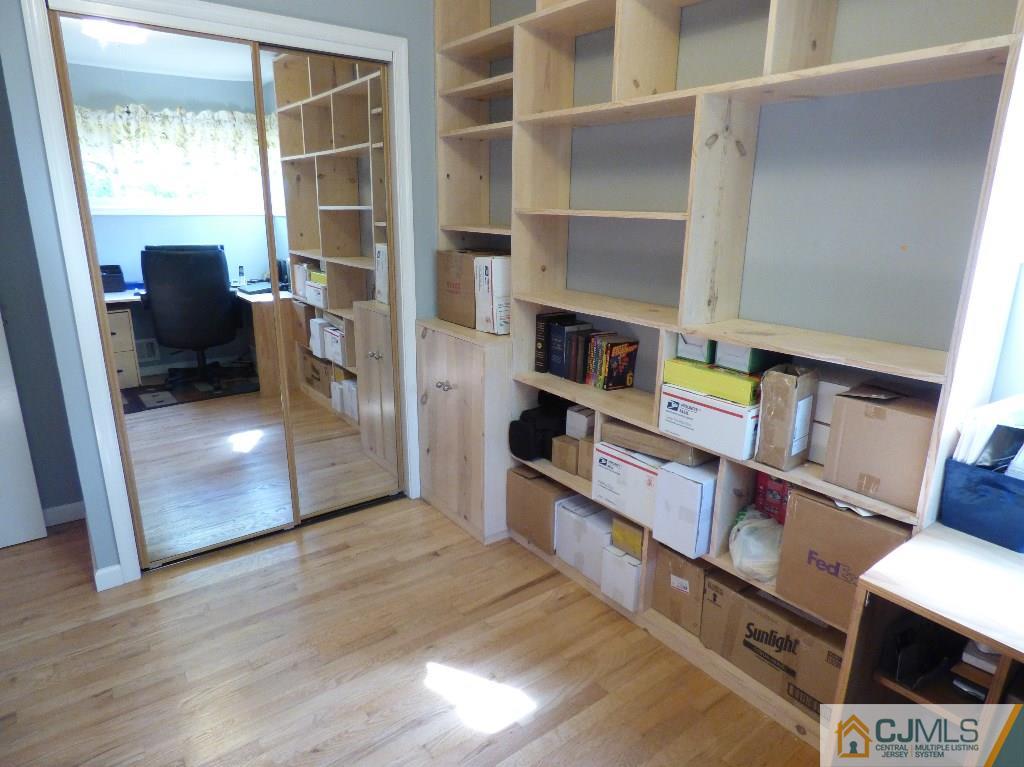 20 Clemson Road Old Bridge, NJ 08859 - Photo 15 of 25 a view of a workspace with furniture and a window