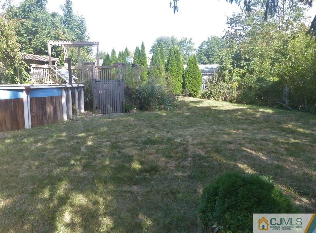 20 Clemson Road Old Bridge, NJ 08859 - Photo 25 of 25 a view of a yard with large trees