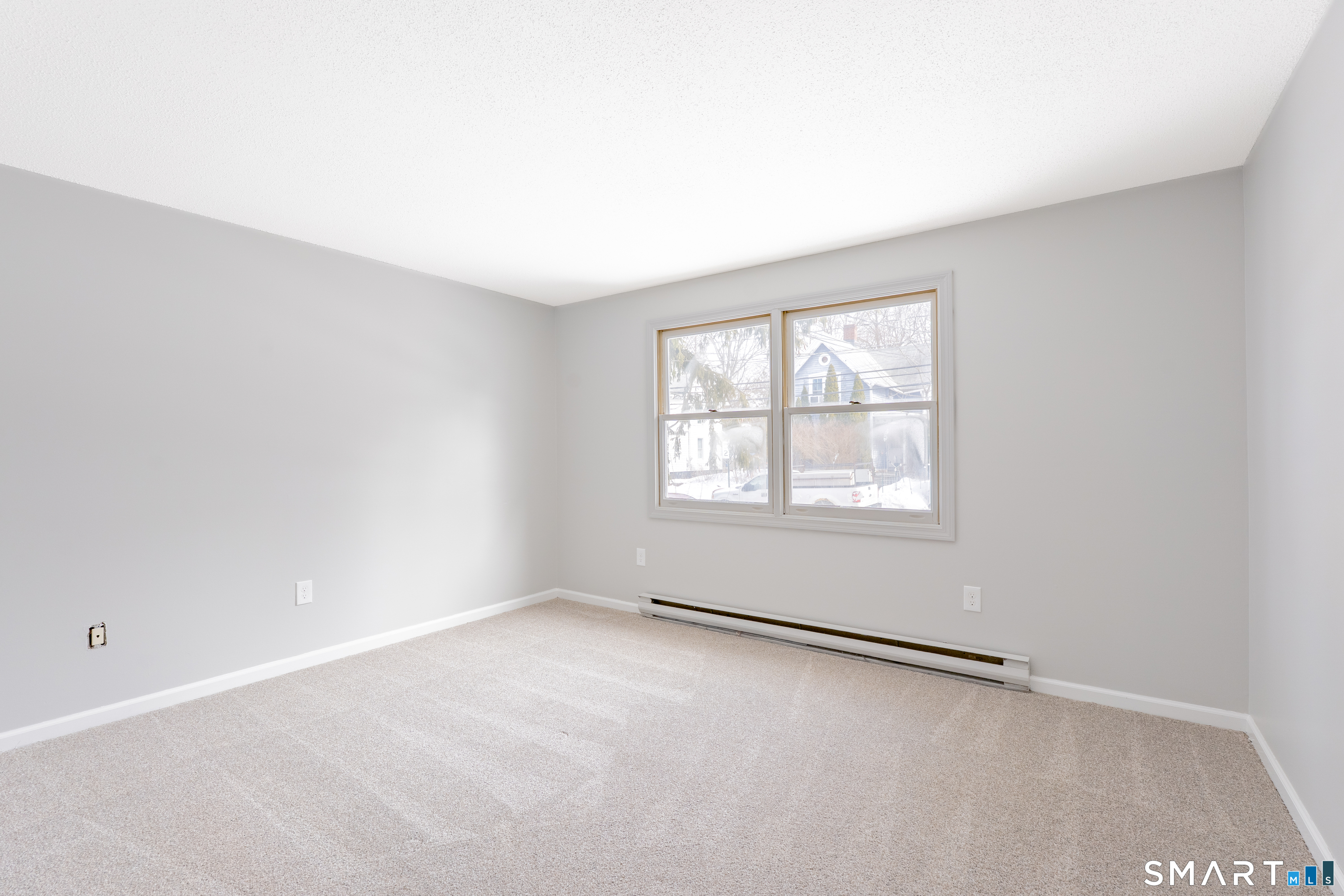 28 Orient Street Meriden, CT 06450 - Photo 11 of 18 an empty room with a window