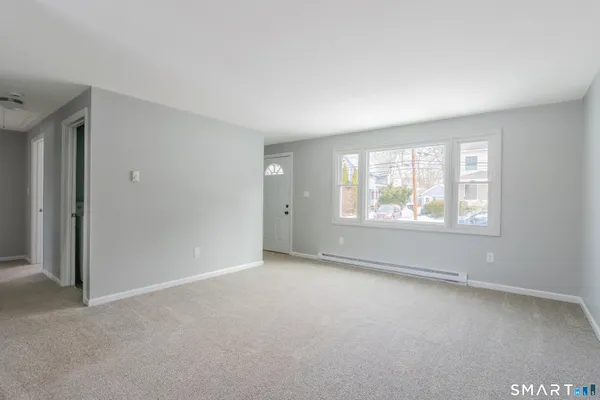 an empty room with windows