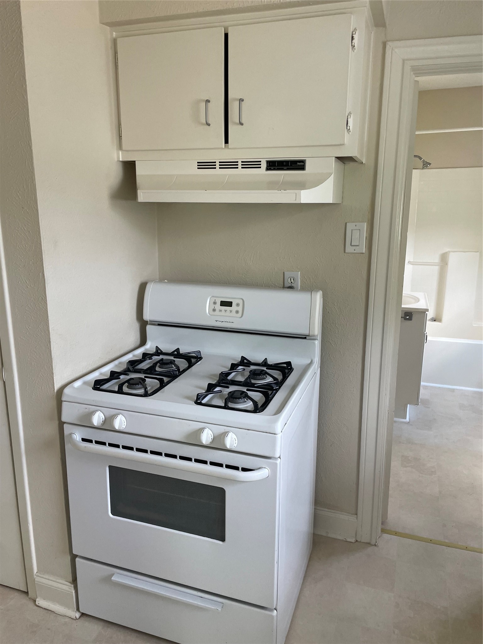 2030 Bissonnet Street Houston, TX 77005 - Photo 18 of 25 a stove top oven sitting inside of a kitchen