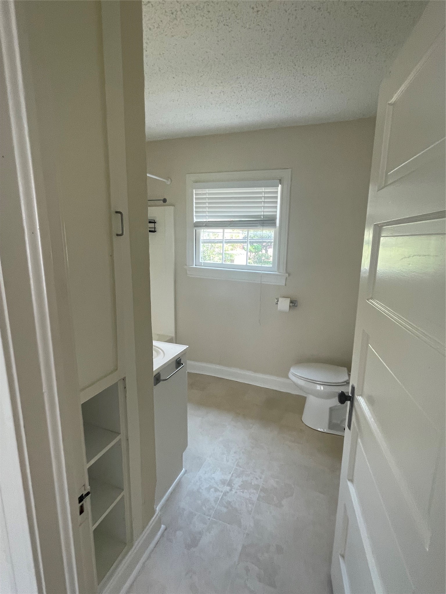 2030 Bissonnet Street Houston, TX 77005 - Photo 20 of 25 a bathroom with a sink a toilet and shower