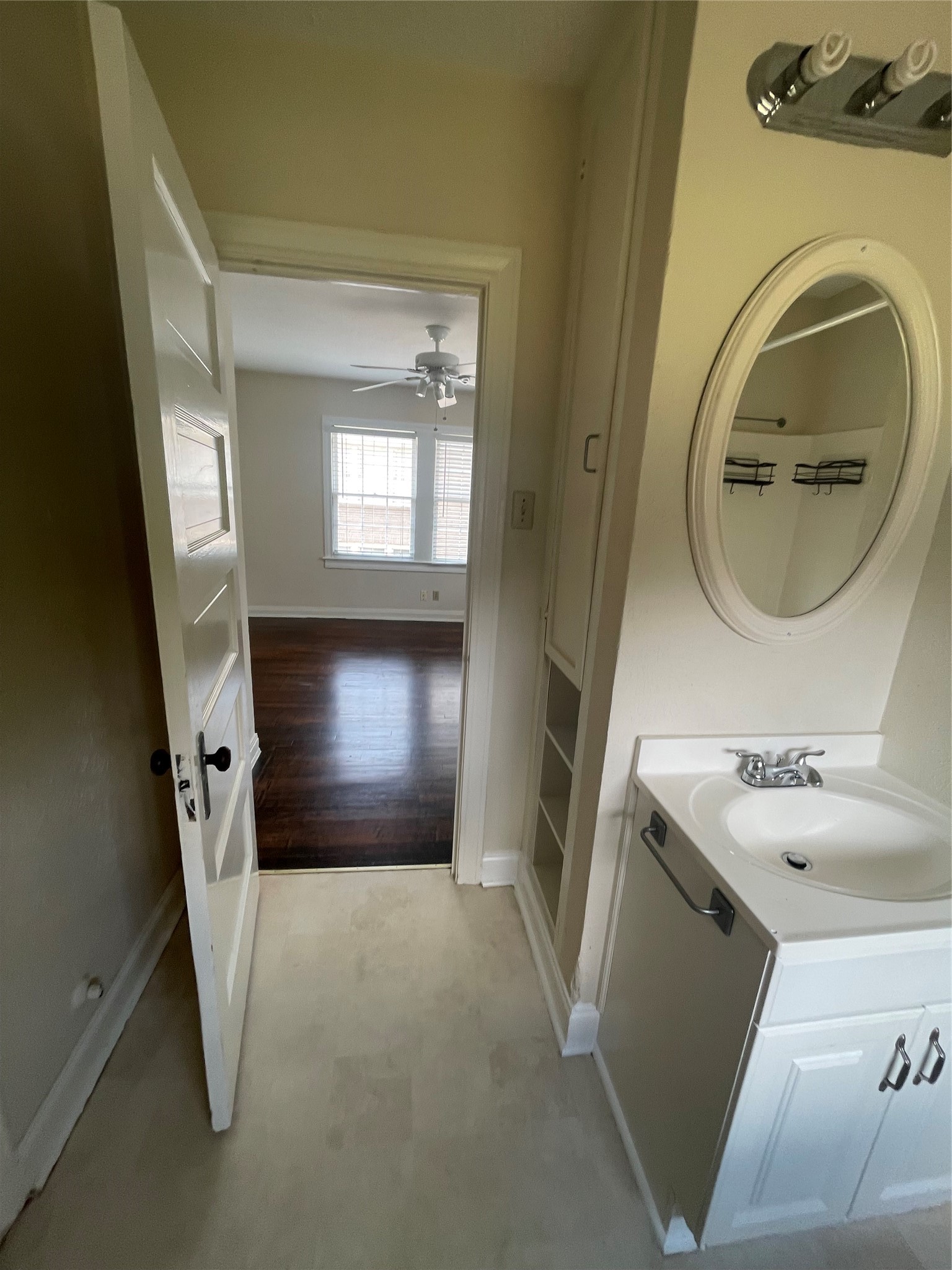 2030 Bissonnet Street Houston, TX 77005 - Photo 24 of 25 a bathroom with a sink and a mirror