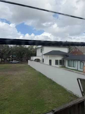 a car parked in front of a house