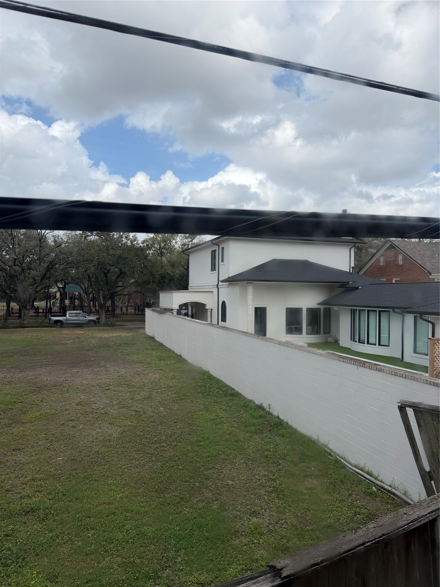2030 Bissonnet Street Houston, TX 77005 - Photo 3 of 25 a view of a house with a yard