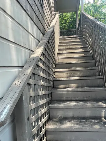 a kitchen with a sink cabinets and window