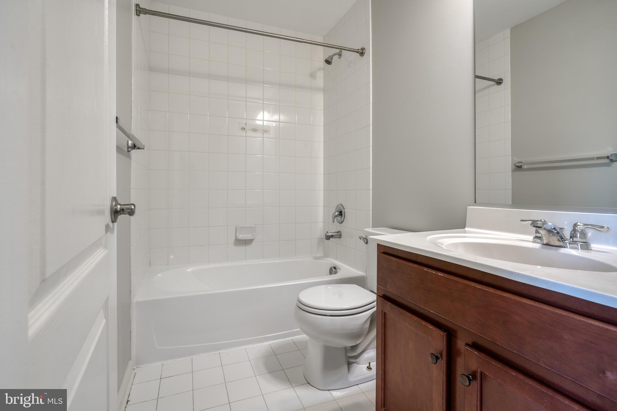 985 Morgan Run Road Middle River, MD 21220 - Photo 21 of 33 a bathroom with a sink toilet vanity and shower