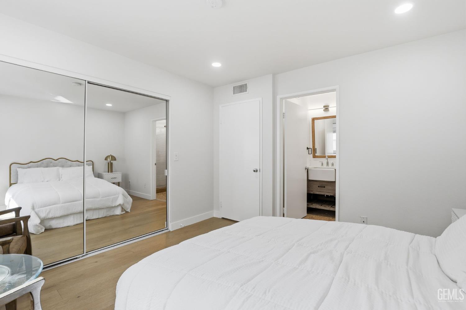 Undisclosed Address North Hollywood, CA 91602 - Photo 12 of 30 a bedroom with a bed and a mirror