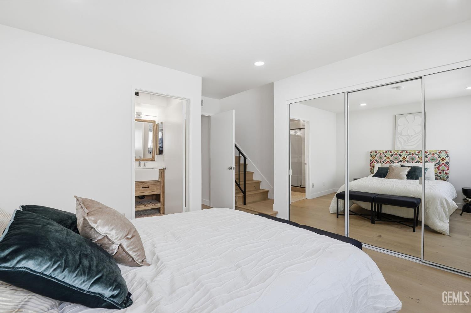 Undisclosed Address North Hollywood, CA 91602 - Photo 15 of 30 a bedroom with a bed and a couch