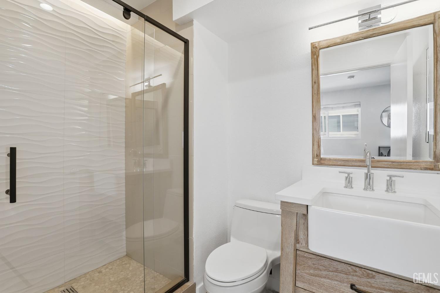 Undisclosed Address North Hollywood, CA 91602 - Photo 16 of 30 a bathroom with a toilet a sink and shower