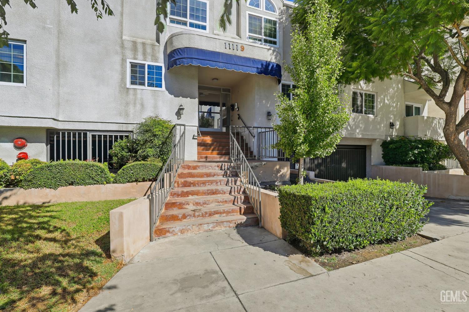 Undisclosed Address North Hollywood, CA 91602 - Photo 24 of 30 a front view of a house with a yard