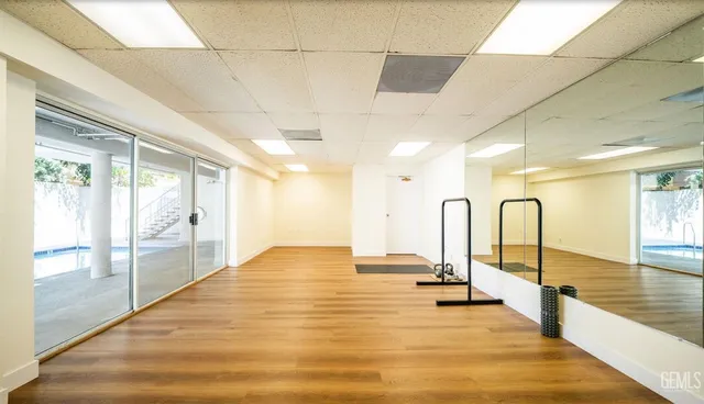 a view of a bathroom with sink and mirror