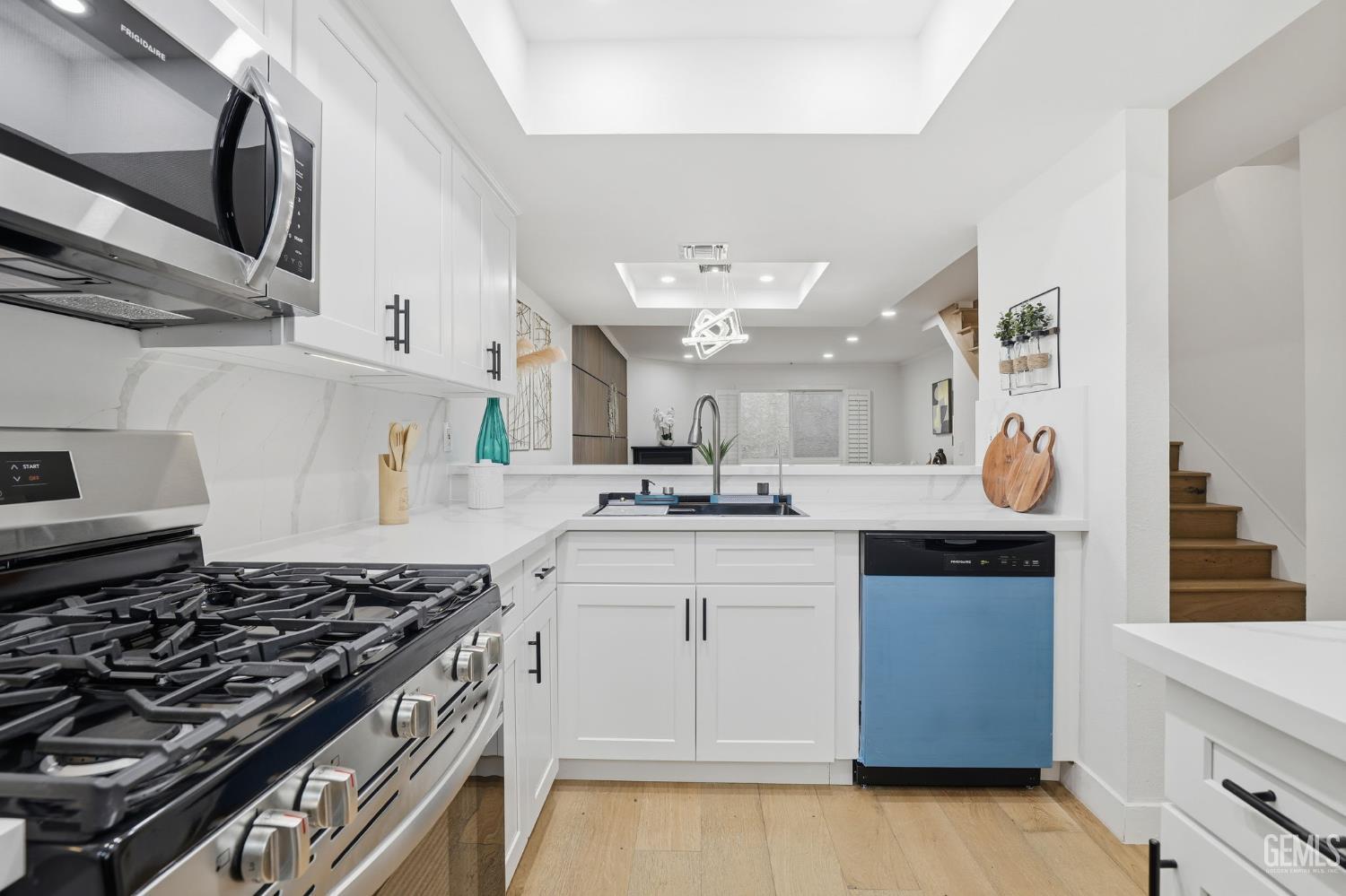 Undisclosed Address North Hollywood, CA 91602 - Photo 8 of 30 a kitchen with granite countertop a sink stove and cabinets