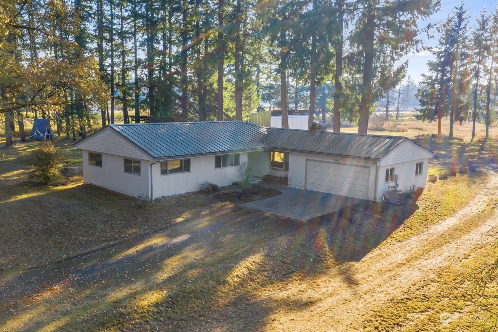 17734 Case Road Southwest Rochester, WA 98579 - Photo 2 of 35 a view of a house with a yard