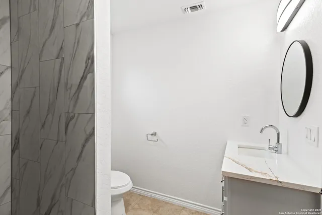 a view of a big room with carpet