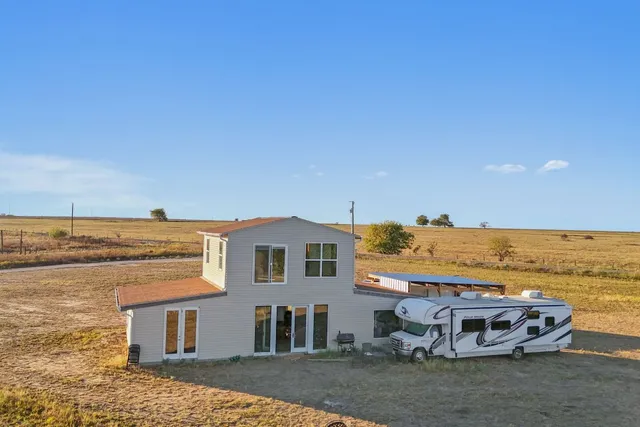 a view of a terrace with a ocean view