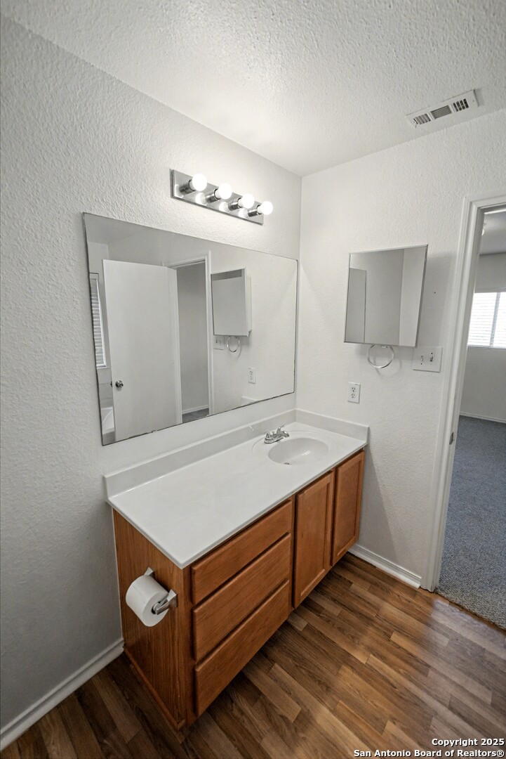 3615 Longhorn Creek San Antonio, TX 78261 - Photo 20 of 42 a room with a sink and cabinets
