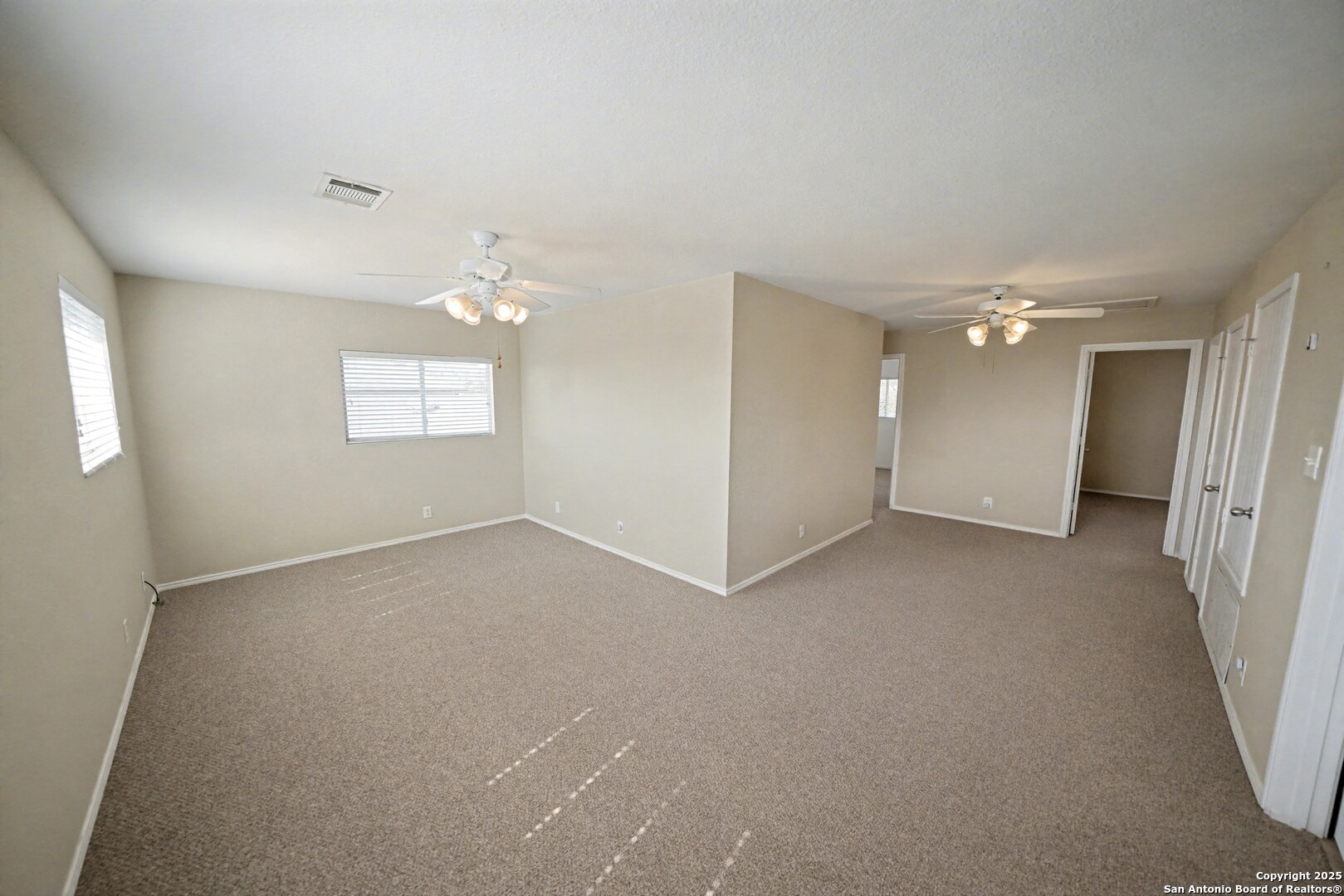 3615 Longhorn Creek San Antonio, TX 78261 - Photo 23 of 42 a view of an empty room with a window