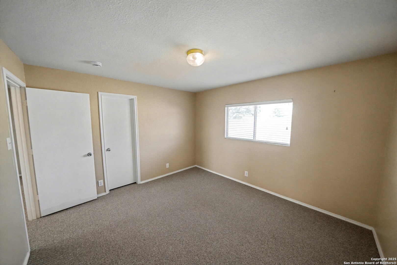 3615 Longhorn Creek San Antonio, TX 78261 - Photo 27 of 42 a view of an empty room with a window